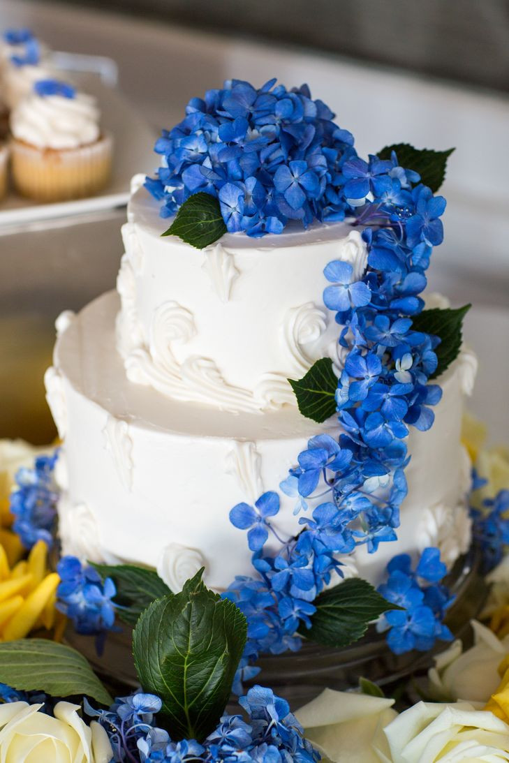 Wedding Cakes With Blue Flowers
 Two Tier Wedding Cake with Cascading Blue Flowers