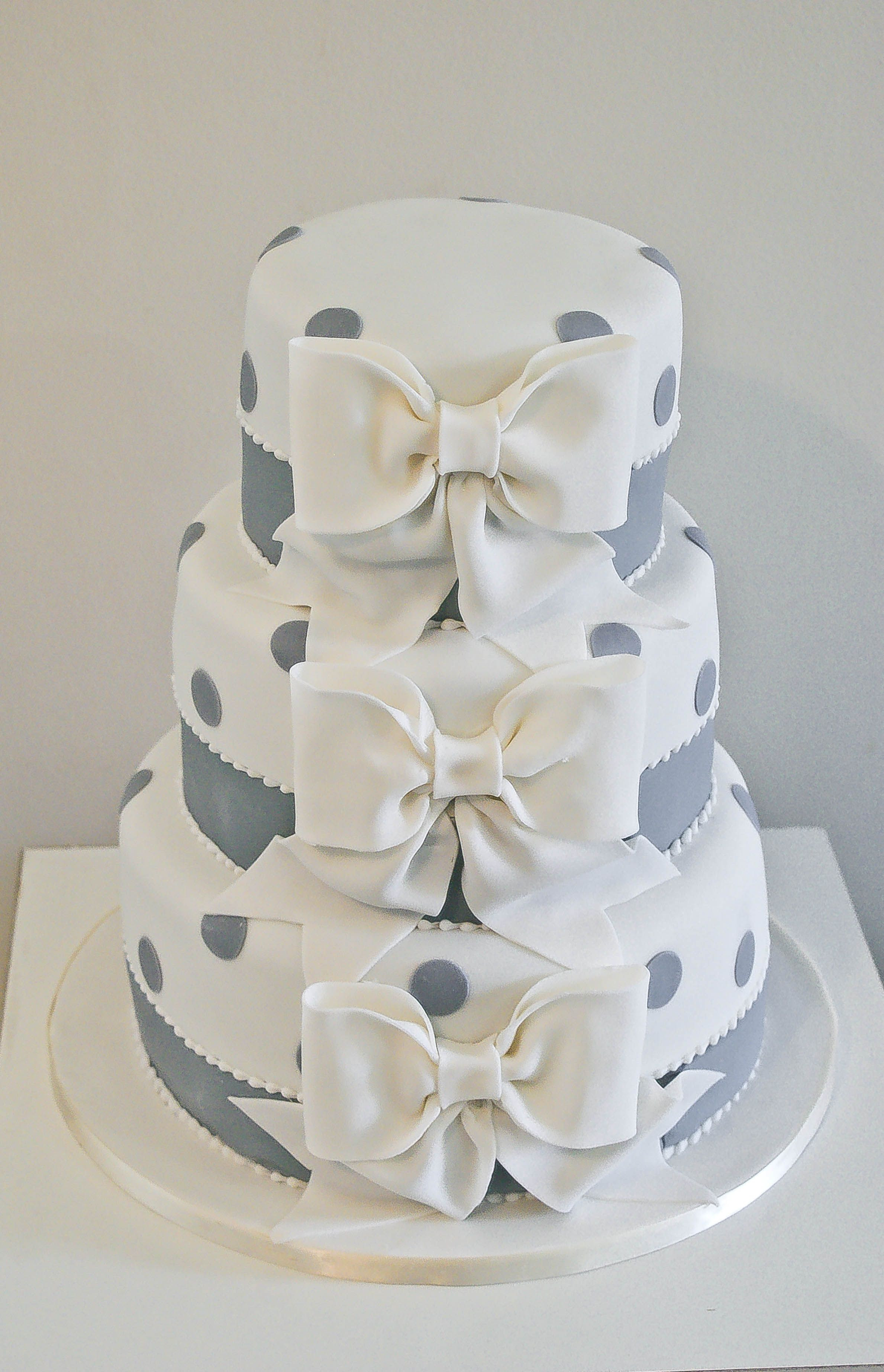 Wedding Cakes With Bow
 Bow polka dot wedding cake My Work Pinterest