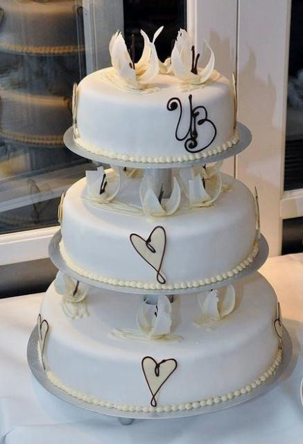 Wedding Cakes With Columns
 3 tier round white wedding cake with columns between