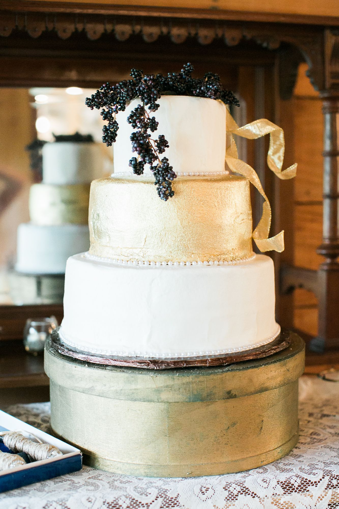 Wedding Cakes With Gold Accents
 Gold Wedding Cake With Blue Berry Accents