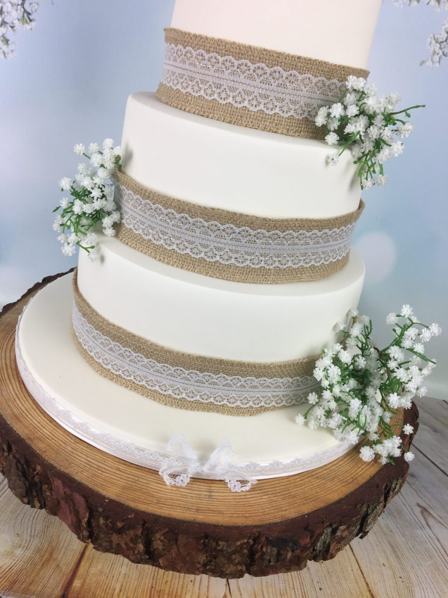 Wedding Cakes With Lace
 Hessian and lace wedding cake with bride and groom topper