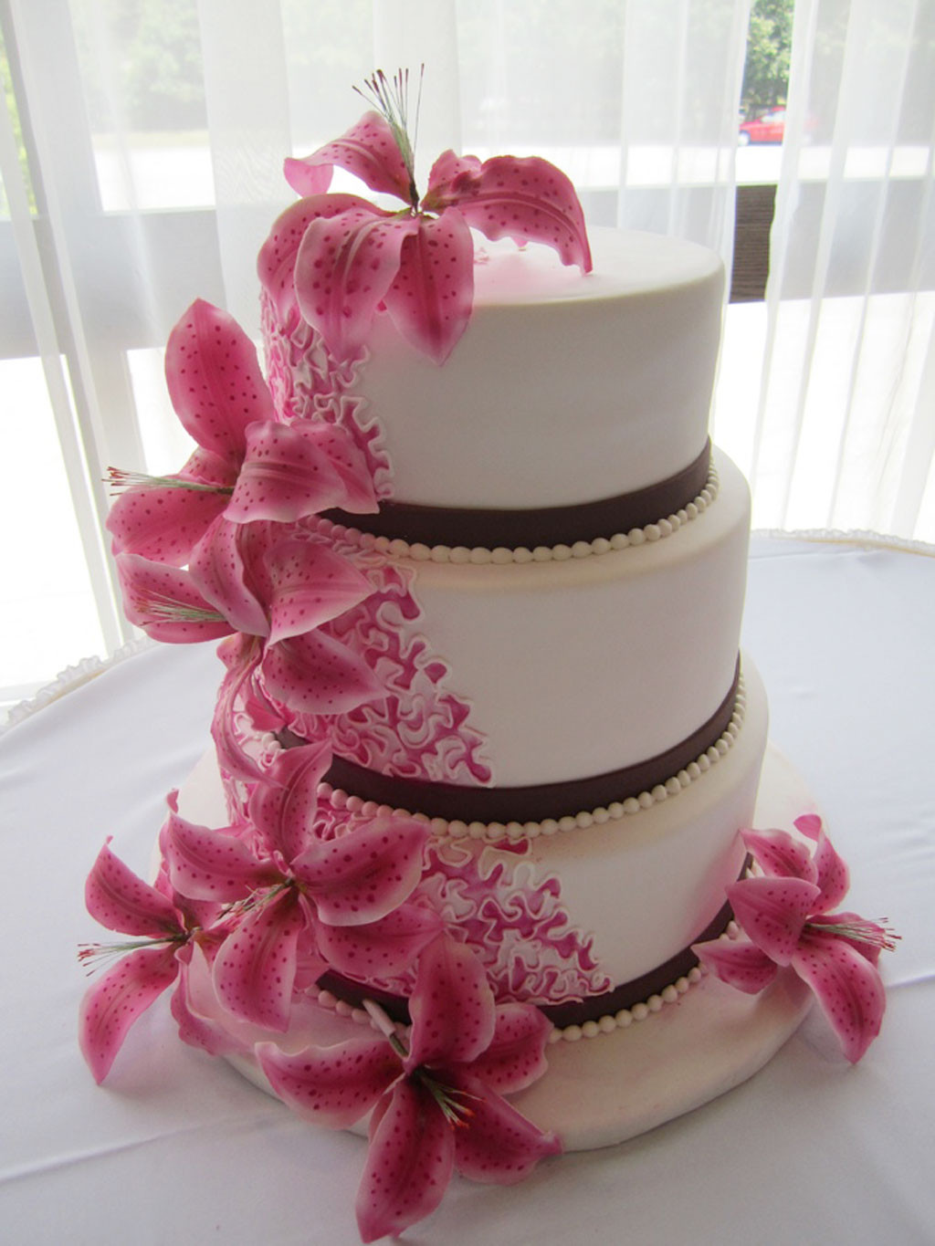 Wedding Cakes With Lilies
 Round Stargazer Lilies Wedding Cakes Wedding Cake Cake