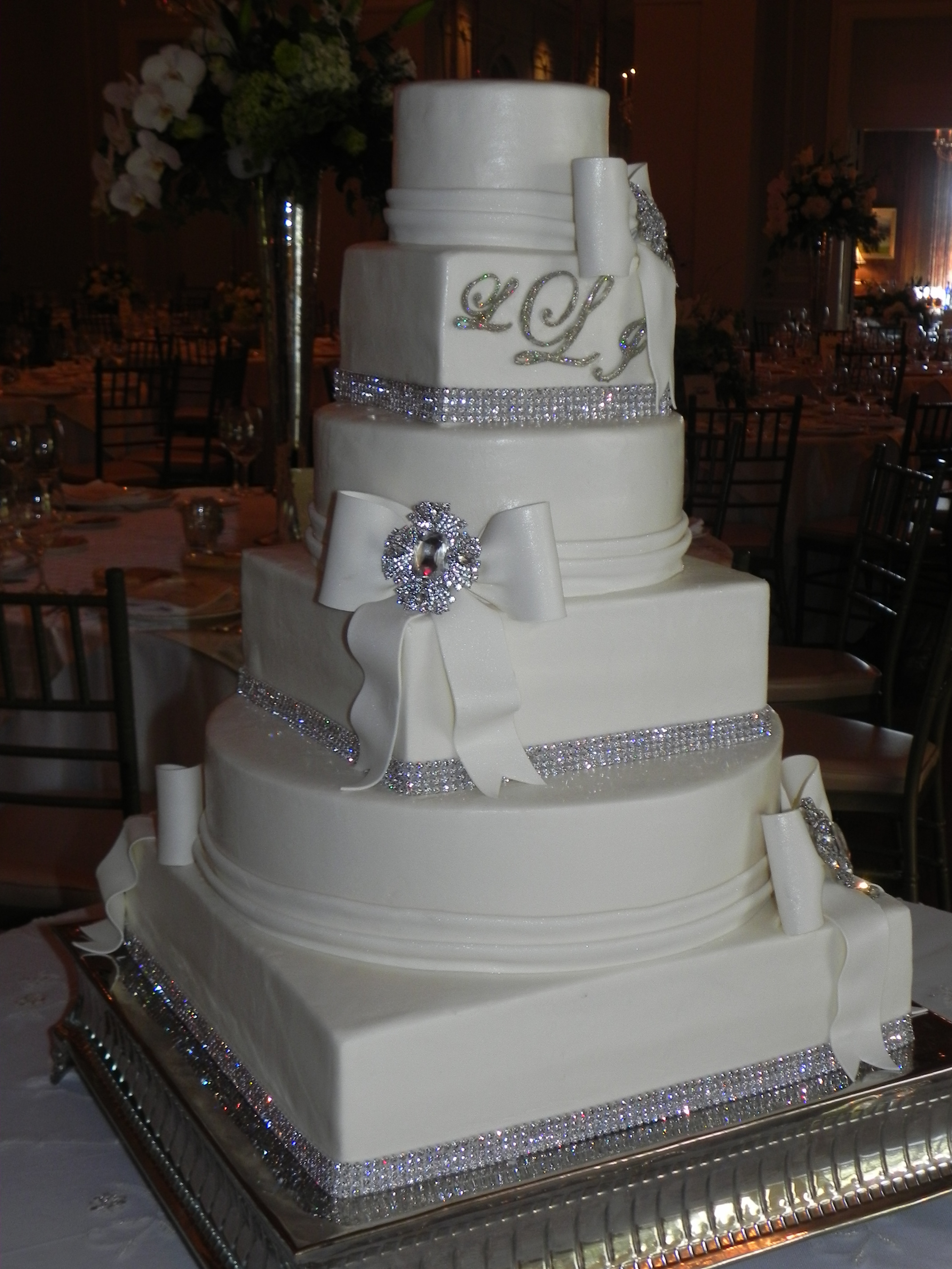 Wedding Cakes With Rhinestones
 Rhinestones and brooches wedding cake with bows and