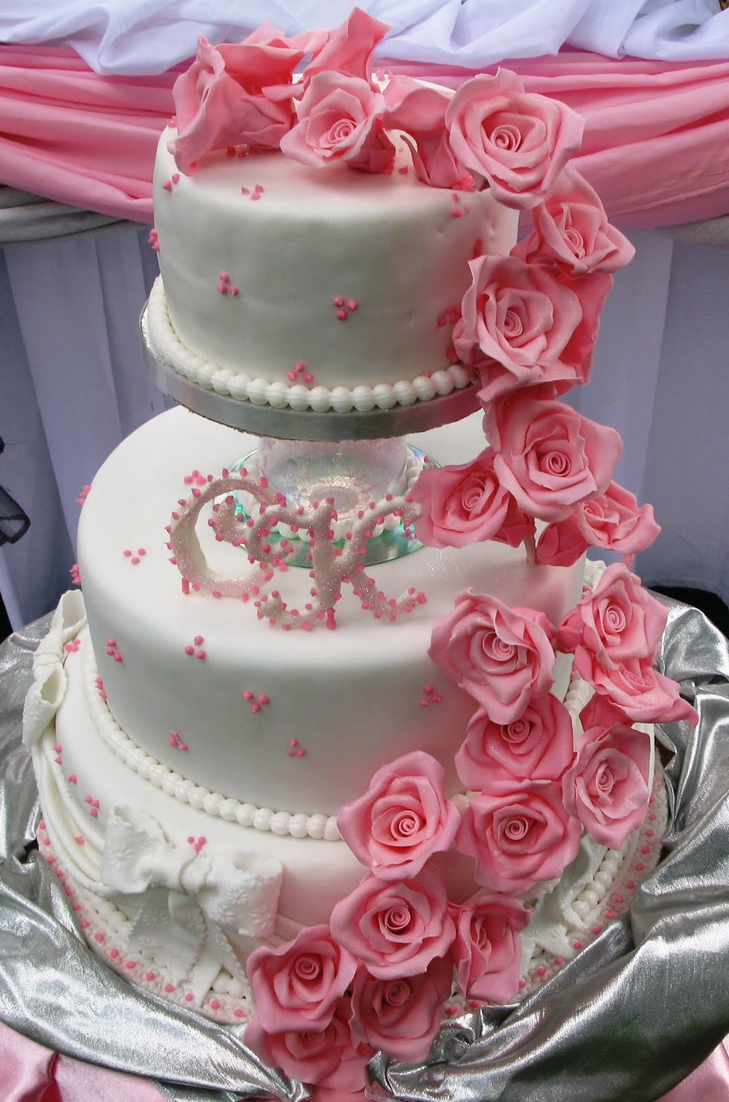 Wedding Cakes With Roses
 Sugarcraft by Soni Three Tier Wedding Cake & Roses