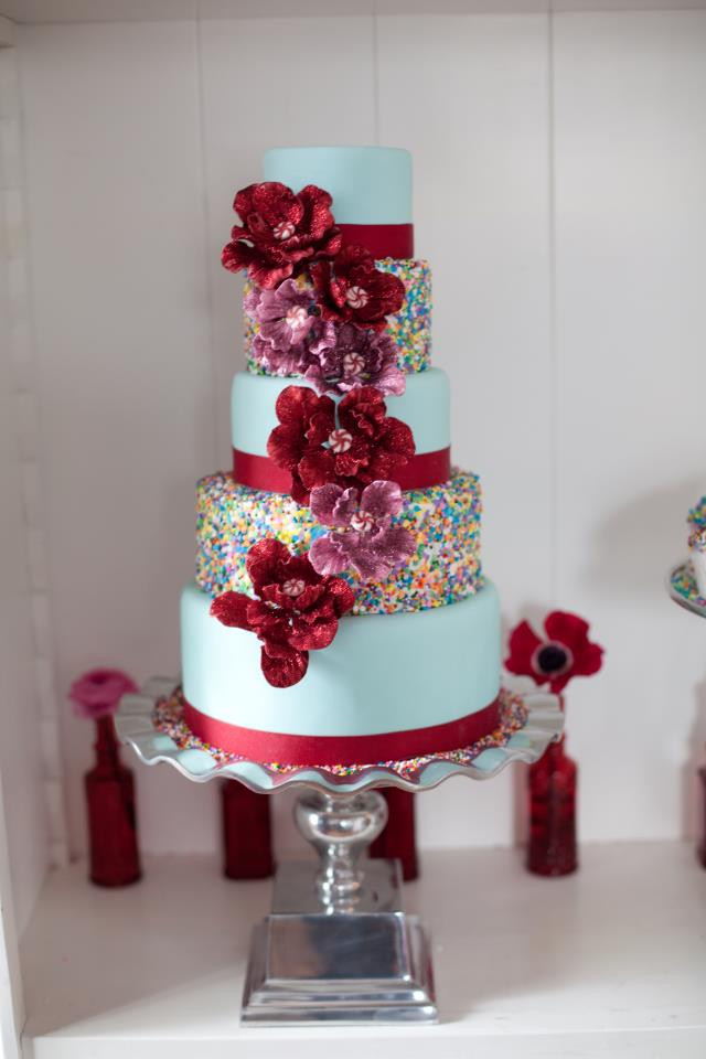 Wedding Cakes With Sprinkles
 Whimsical Wedding Cake with Rainbow Sprinkles Red Blooms