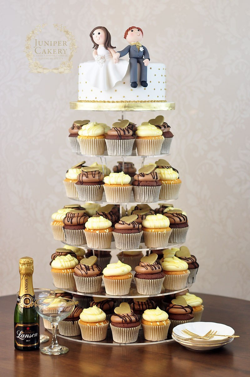 Wedding Cupcakes Towers
 Fun Wedding Cupcake Tower with Bride and Groom