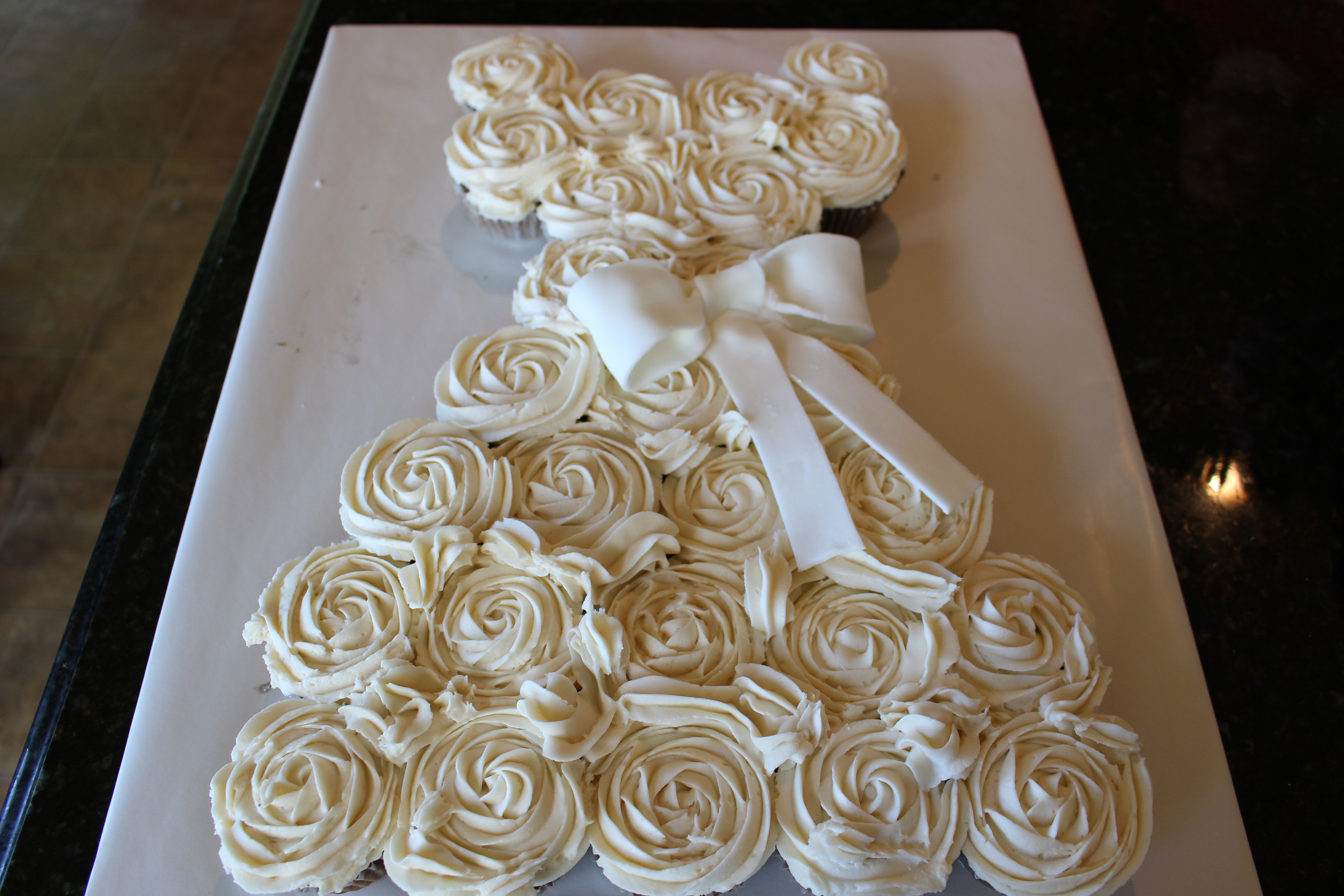 Wedding Dress Cupcakes
 Amazing Bridal Gown Cupcake Cake AxiMedia