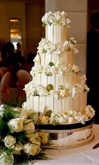 White And Chocolate Wedding Cake
 Four tier white chocolate wedding cake with white roses JPG