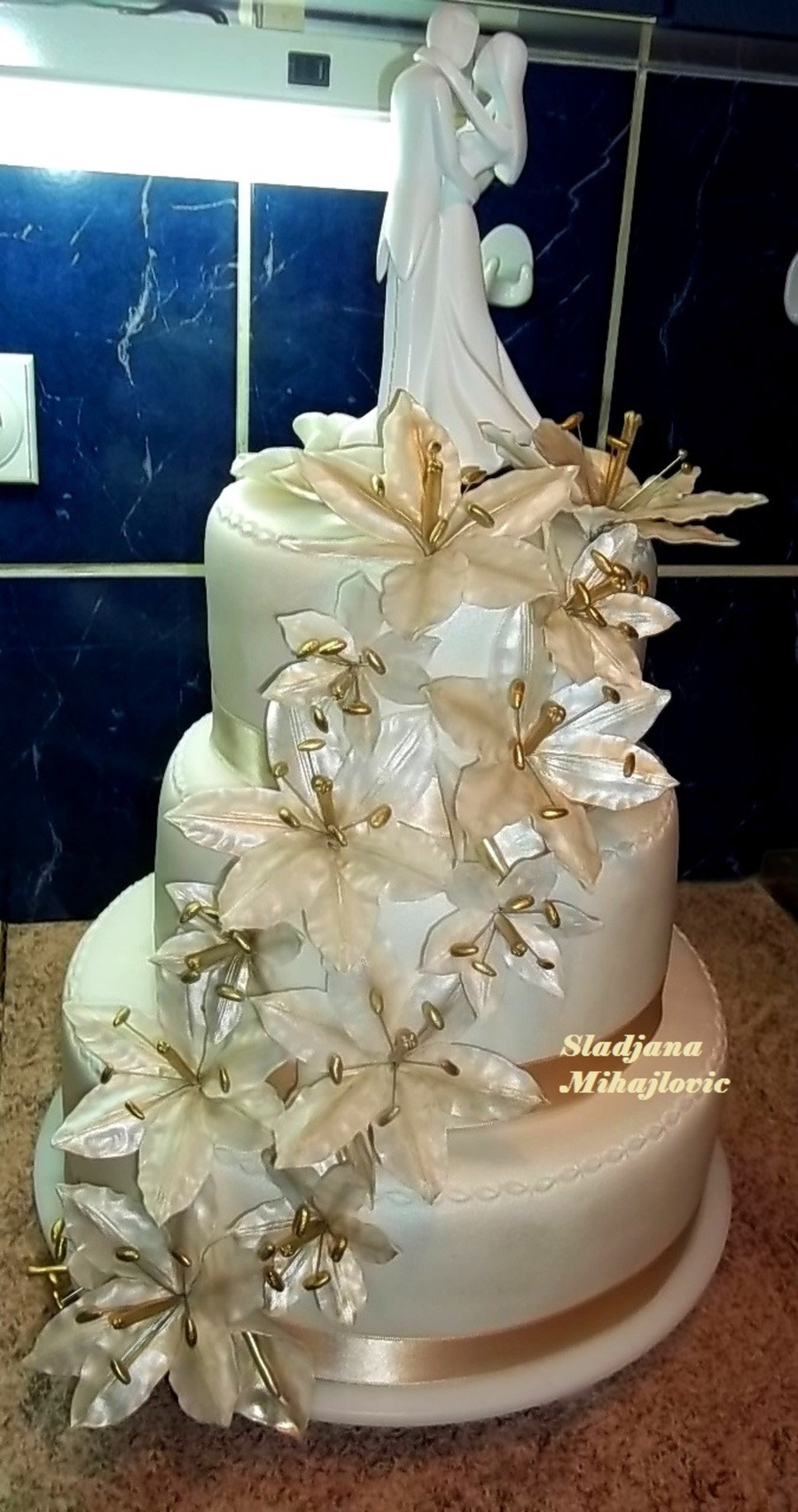 White And Gold Wedding Cake
 Flower Lily White Gold Wedding Cake CakeCentral