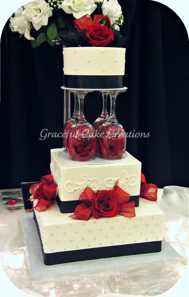 White And Red Wedding Cake
 Elegant White Black and Red Wedding Cake a photo on