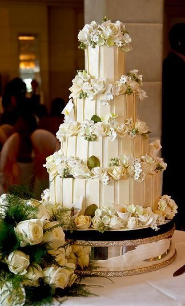 White Chocolate Wedding Cake
 Four Tier White Chocolate Wedding Cake With White Roses