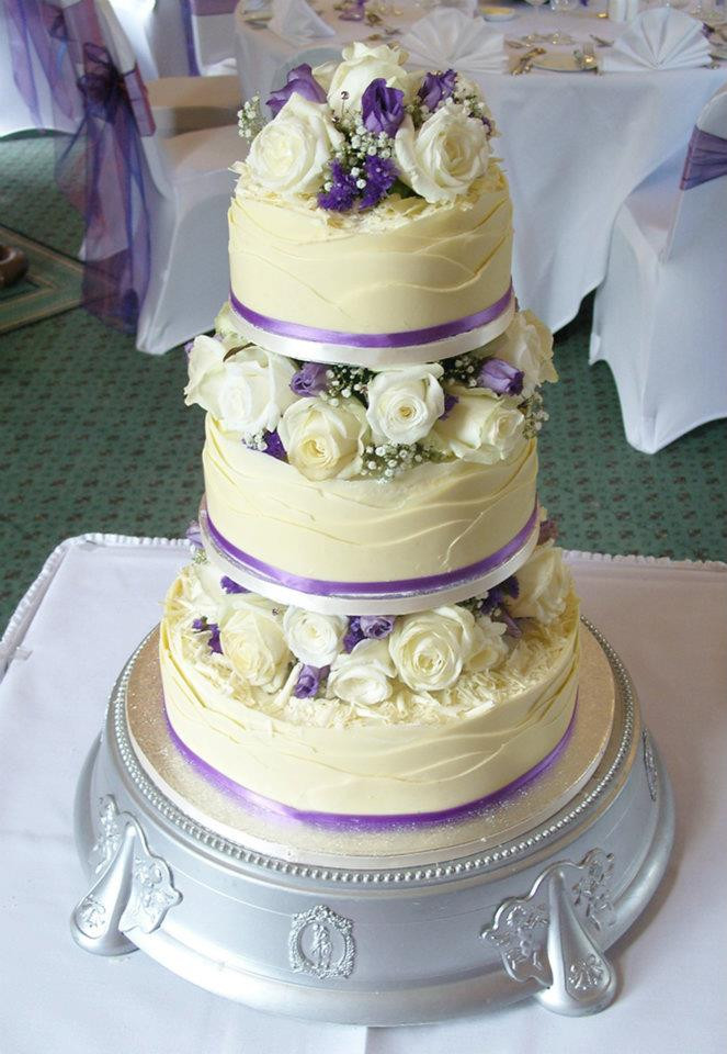 White Chocolate Wedding Cake
 White chocolate wrapped wedding cake 2 by KarenJerram on