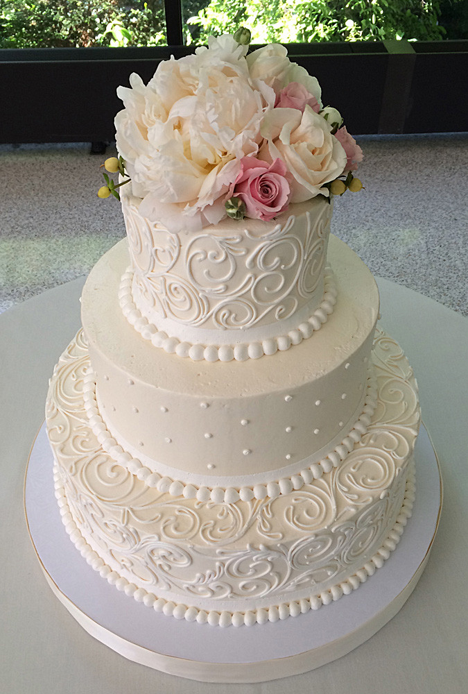 White Wedding Cake With Flowers
 Classic Wedding Cakes