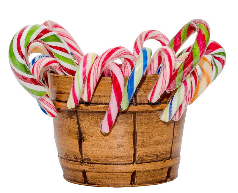 Christmas Candy Sticks
 Colored Candy Sticks And Christmas Lollipops In A Brown