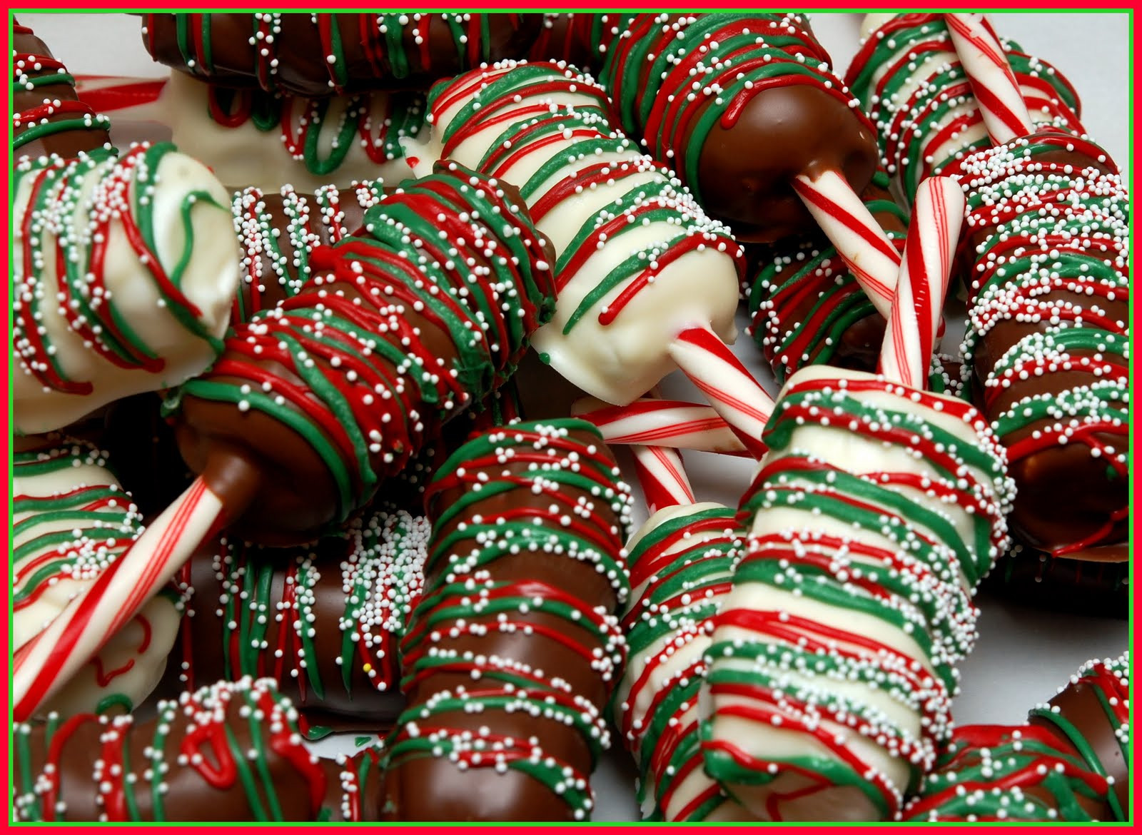 Christmas Chocolate Candy
 CHOCOLATE DIPPED MARSHMALLOWS ON CANDY CANES Hugs and