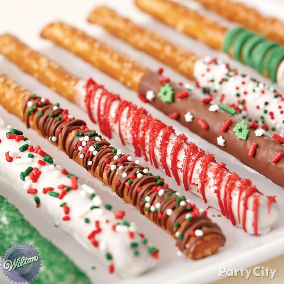 Christmas Dipped Pretzels
 Dipped pretzel sticks Trays and Caroler on Pinterest