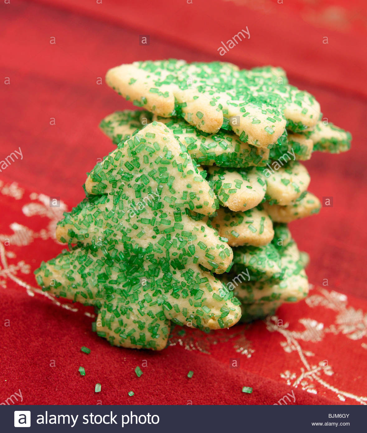 Christmas Sugar Cookies With Sprinkles
 Christmas Tree Sugar Cookies with Green Sprinkles Stock