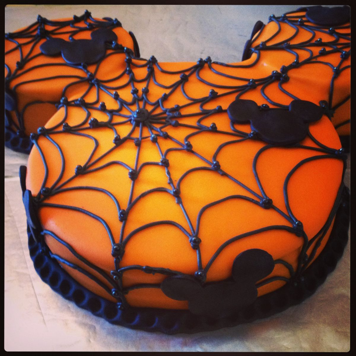 Halloween Spider Cakes
 Make a Halloween Mickey Mouse cake the pipe on icing in